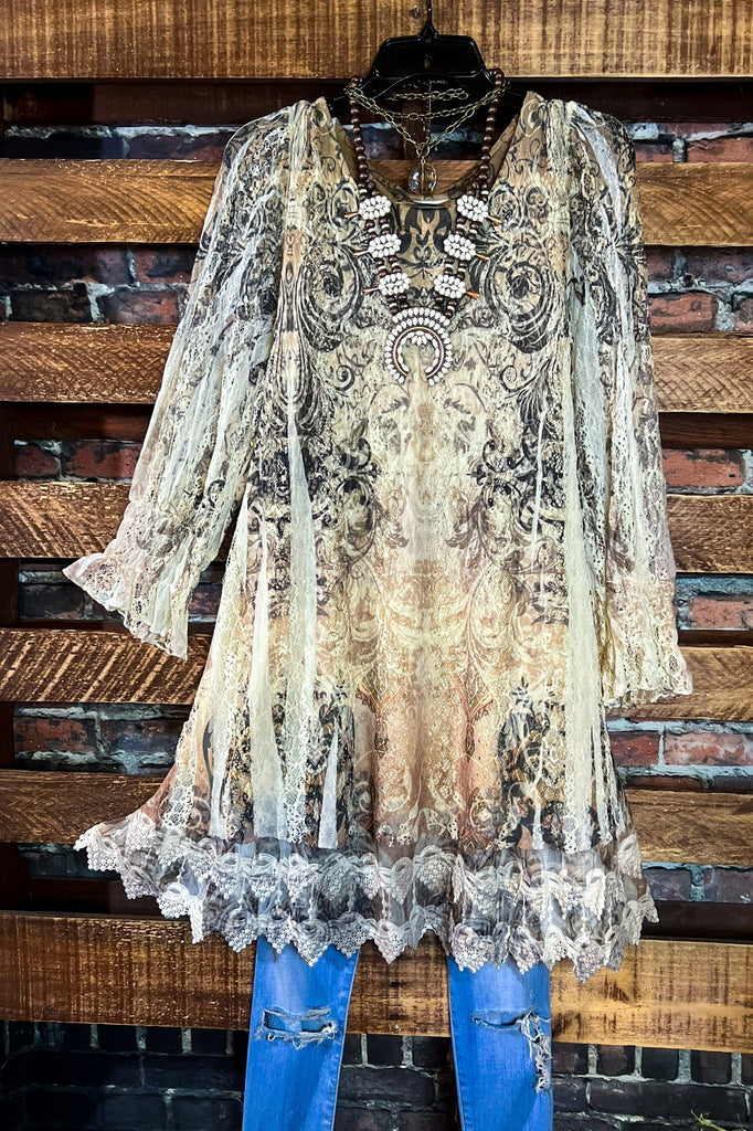 A FAIRYTALE STORY LACE TUNIC LAYERED IN BEIGE TAUPE BROWN
