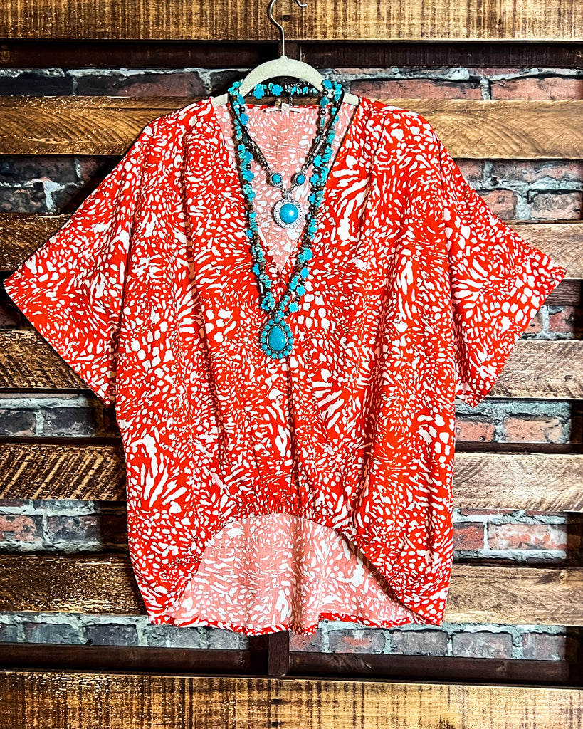 18-20 SIZE- LEOPARD PRINT TOP IN ORANGE --------- SALE
