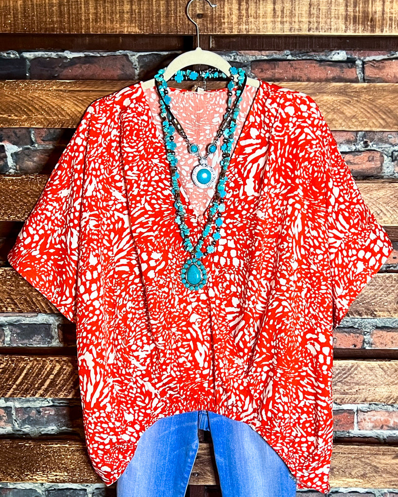 18-20 SIZE- LEOPARD PRINT TOP IN ORANGE --------- SALE