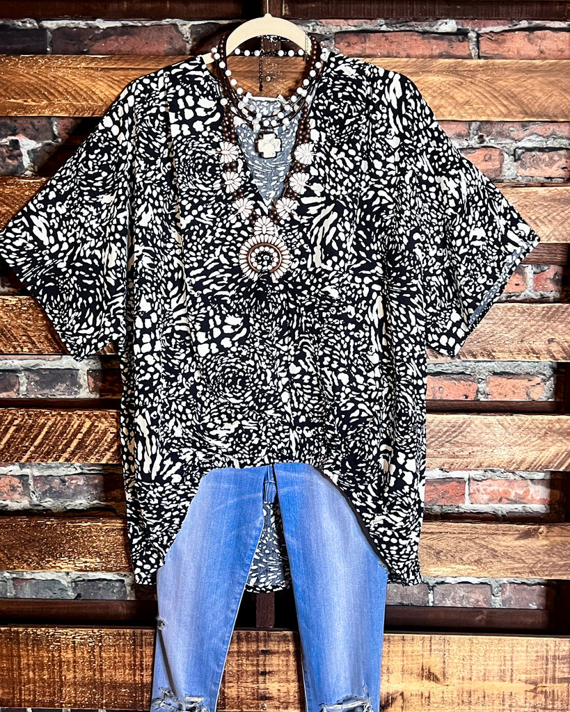 LEOPARD PRINT TOP IN NAVY ------------ SALE