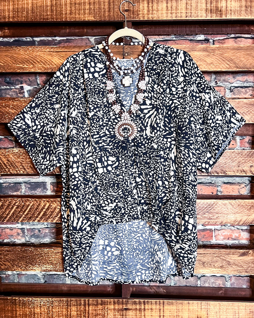 LEOPARD PRINT TOP IN NAVY ------------ SALE