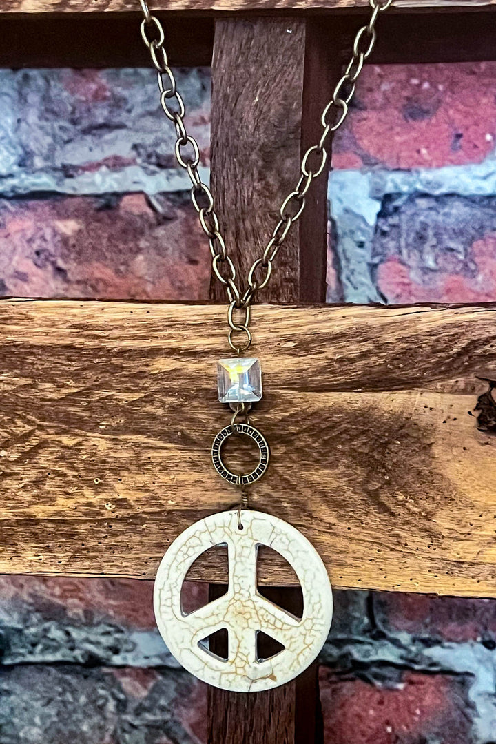 Lost In A Dream Peace Sign Crystal Necklace