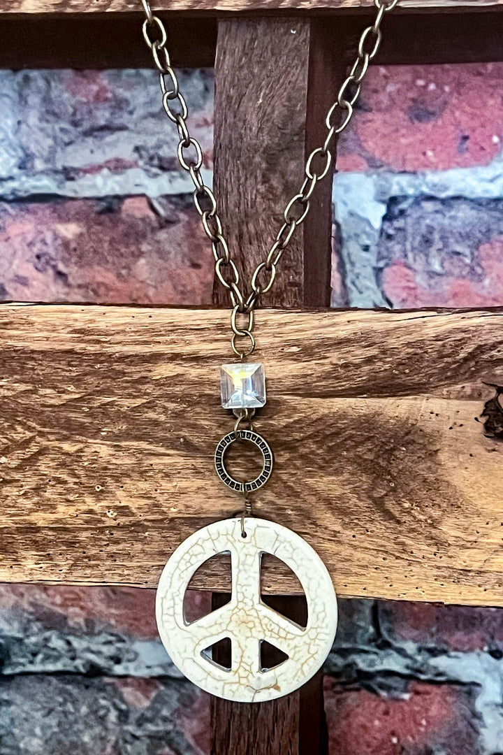 Lost In A Dream Peace Sign Crystal Necklace