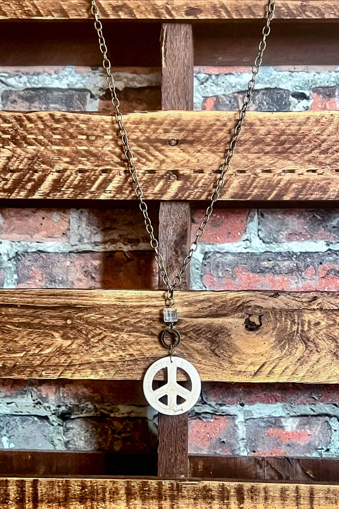 Lost In A Dream Peace Sign Crystal Necklace