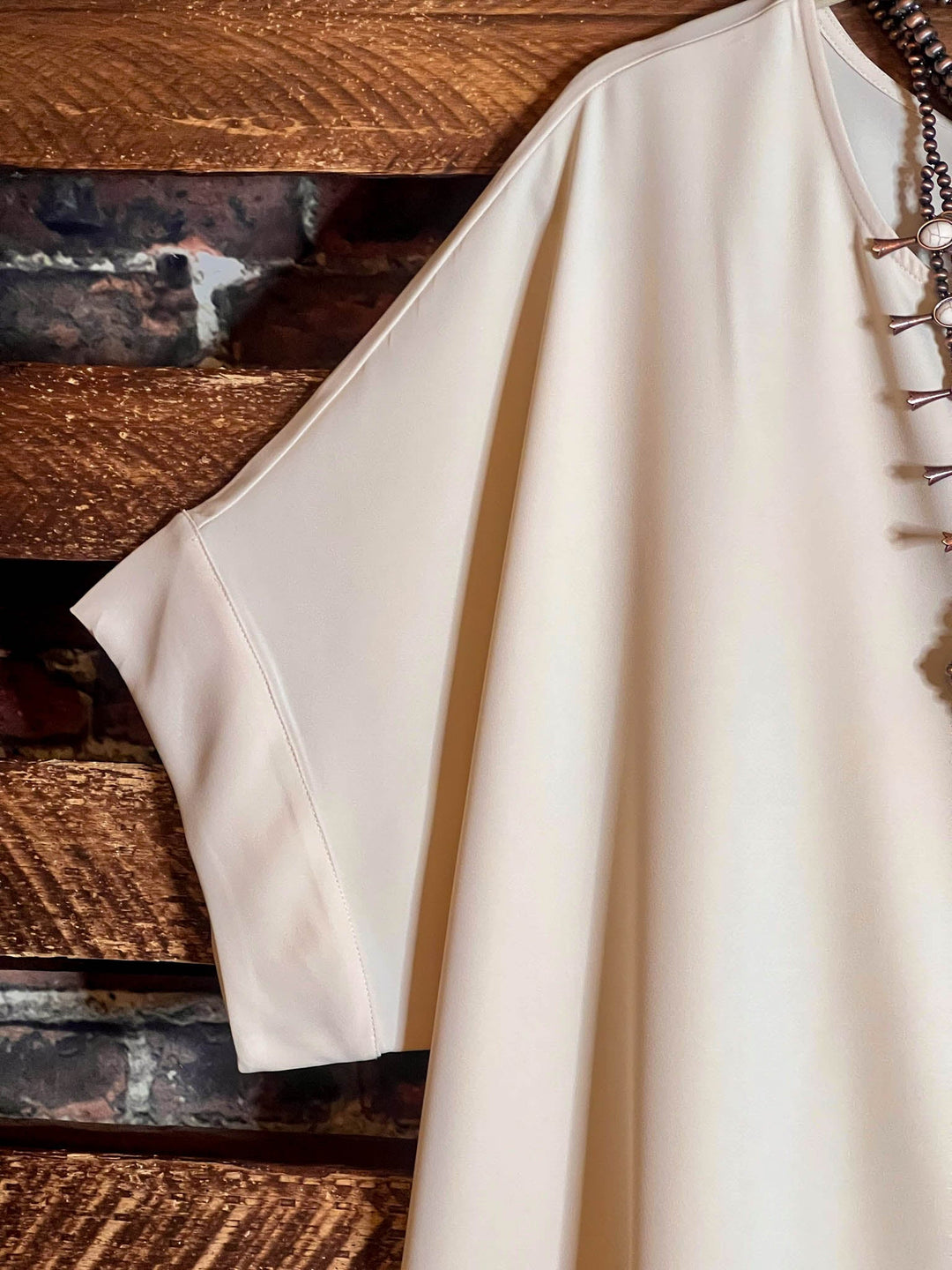 GOING OUT IN THE CITY BEIGE TUNIC