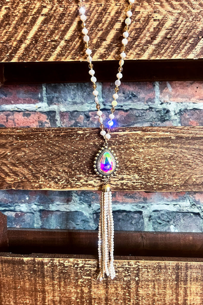 CRYSTAL BEADED TASSEL NECKLACE IN BEIGE