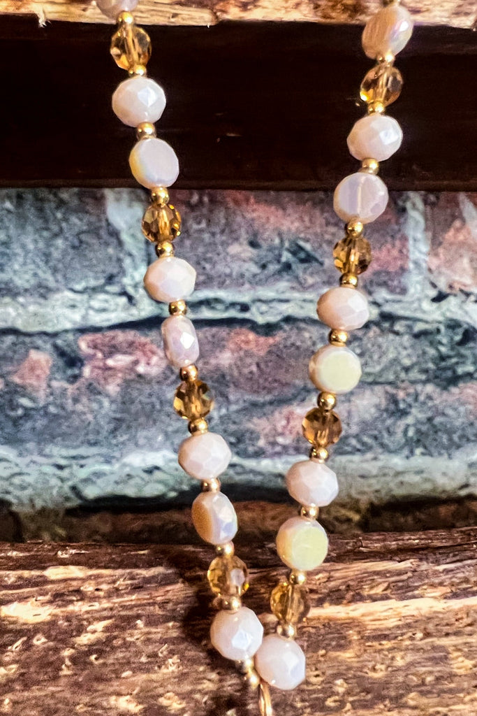 CRYSTAL BEADED TASSEL NECKLACE IN BEIGE