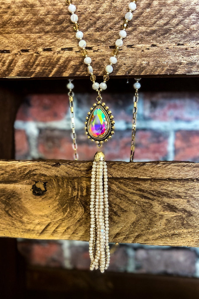 CRYSTAL BEADED TASSEL NECKLACE IN BEIGE