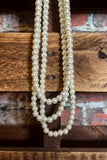 MAGIC TOUCH ON ME PEARLS LAYERED NECKLACE