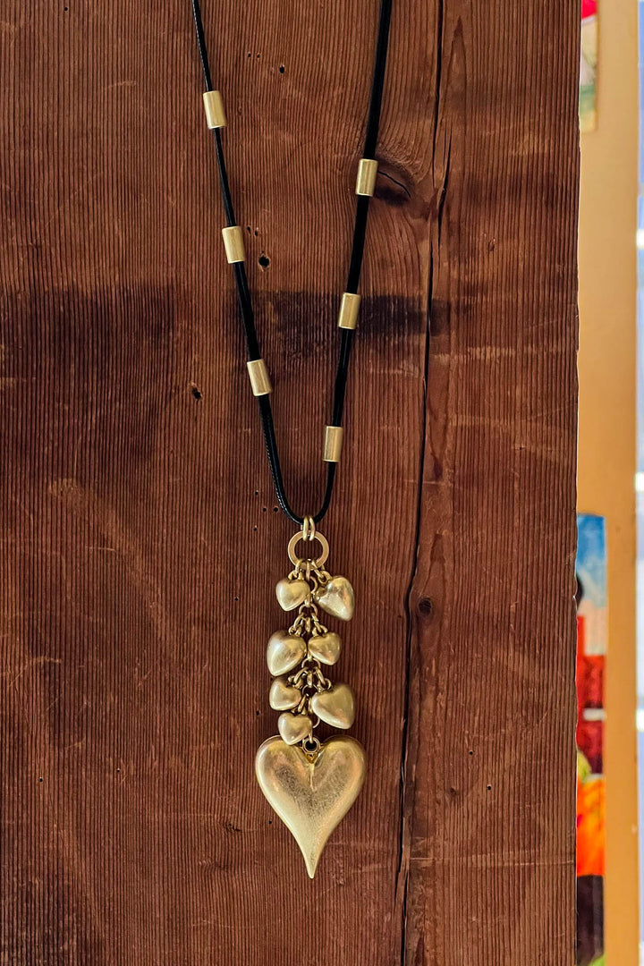 Enchanting Tiered Heart Drop Necklace in Gold Color
