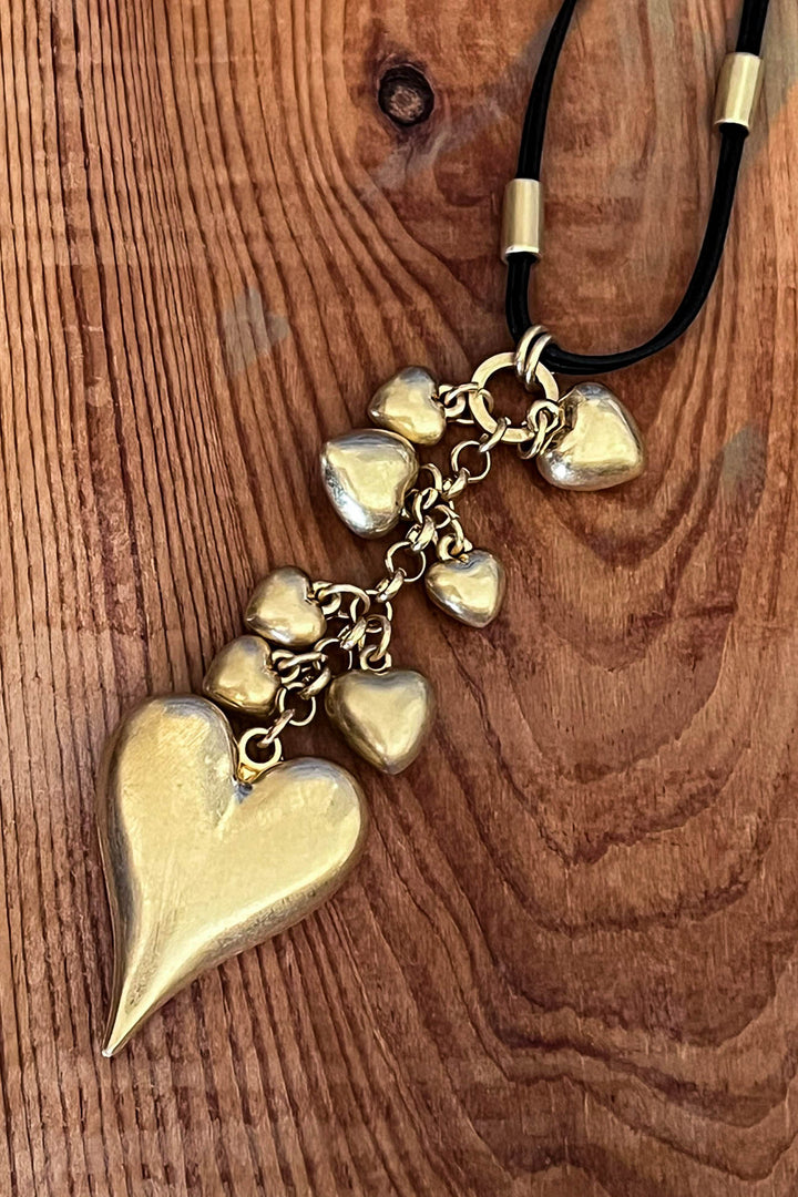 Enchanting Tiered Heart Drop Necklace in Gold Color
