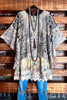 Counting Stars Camo Lace Top Poncho In Army Green