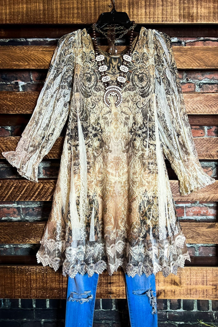 A FAIRYTALE STORY LACE TUNIC LAYERED IN BEIGE TAUPE BROWN