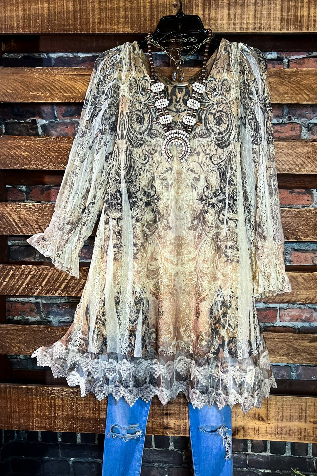 A FAIRYTALE STORY LACE TUNIC LAYERED IN BEIGE TAUPE BROWN