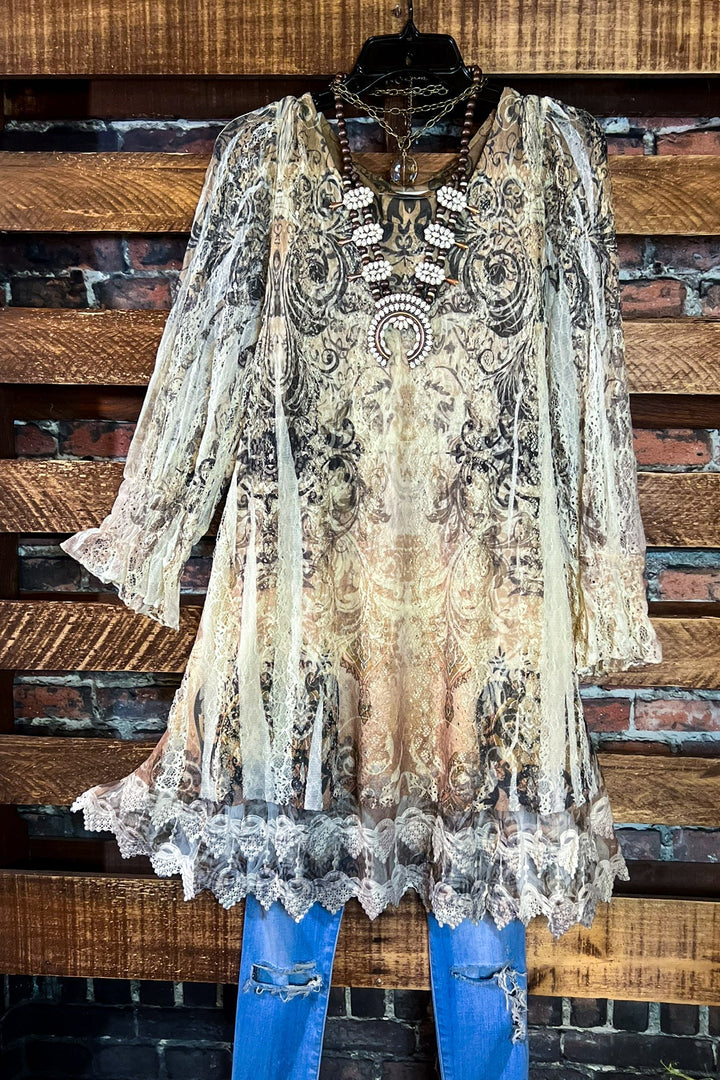 A FAIRYTALE STORY LACE TUNIC LAYERED IN BEIGE TAUPE BROWN