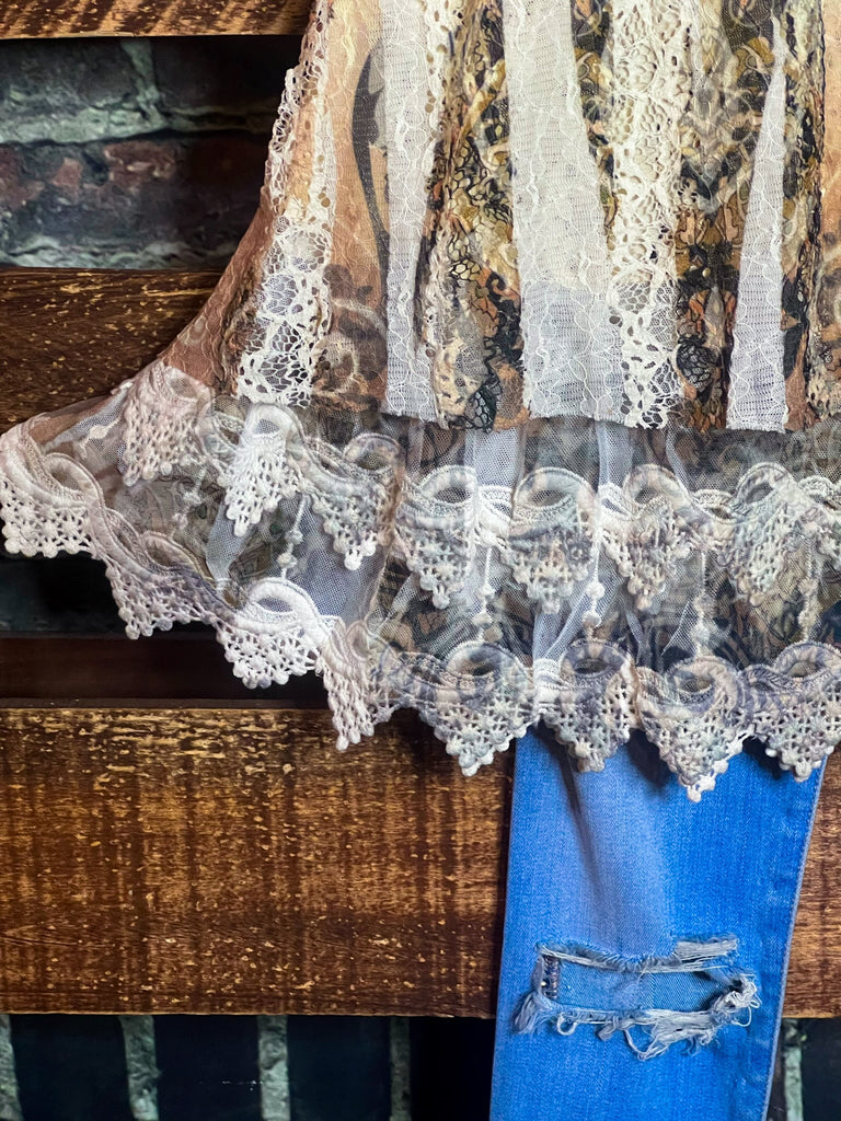 A FAIRYTALE STORY LACE TUNIC LAYERED IN BEIGE TAUPE BROWN