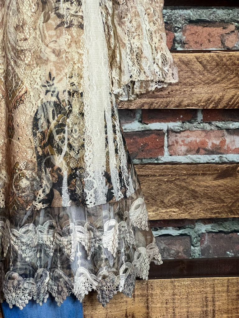 A FAIRYTALE STORY LACE TUNIC LAYERED IN BEIGE TAUPE BROWN