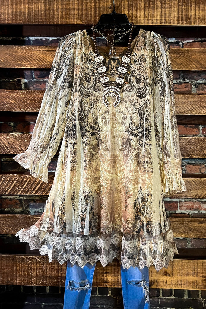 A FAIRYTALE STORY LACE TUNIC LAYERED IN BEIGE TAUPE BROWN