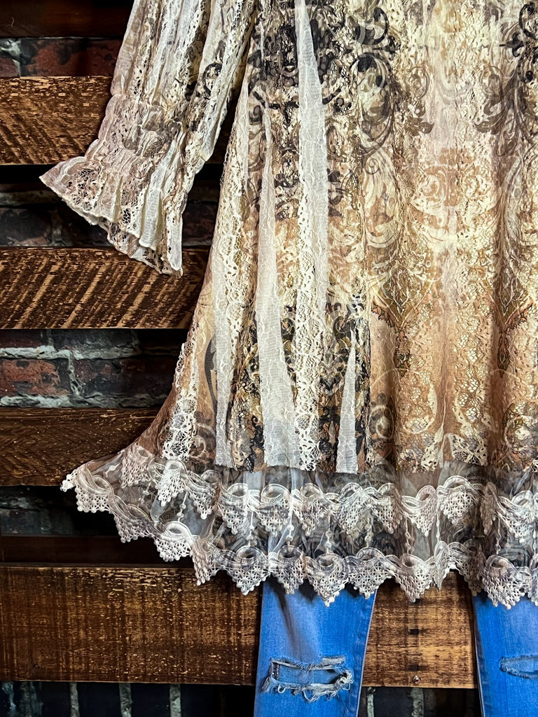 A FAIRYTALE STORY LACE TUNIC LAYERED IN BEIGE TAUPE BROWN