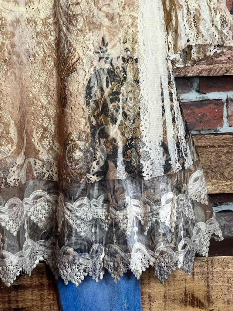 A FAIRYTALE STORY LACE TUNIC LAYERED IN BEIGE TAUPE BROWN
