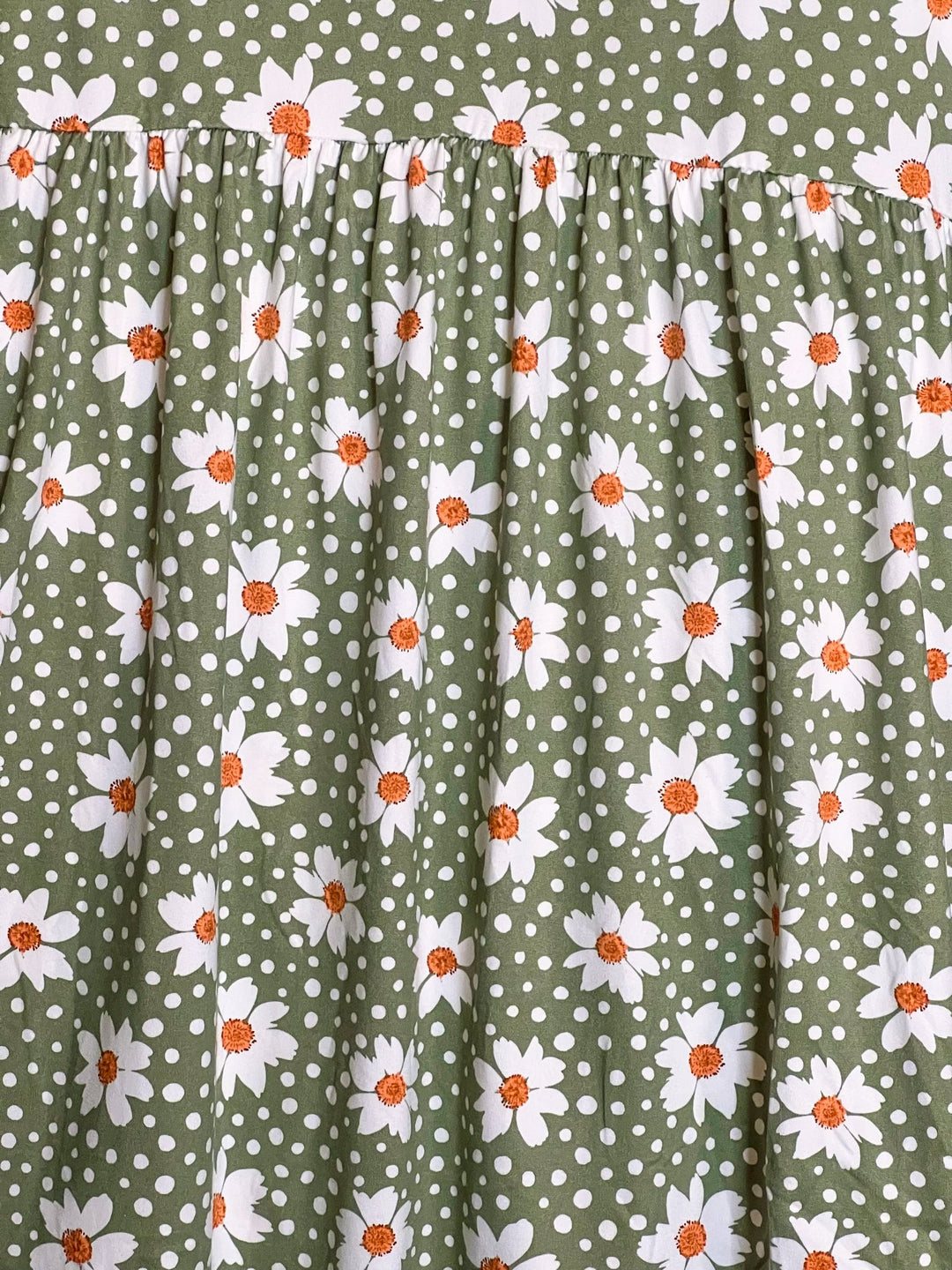 DAISY BLOOMS BABYDOLL TOP IN SAGE FLORAL