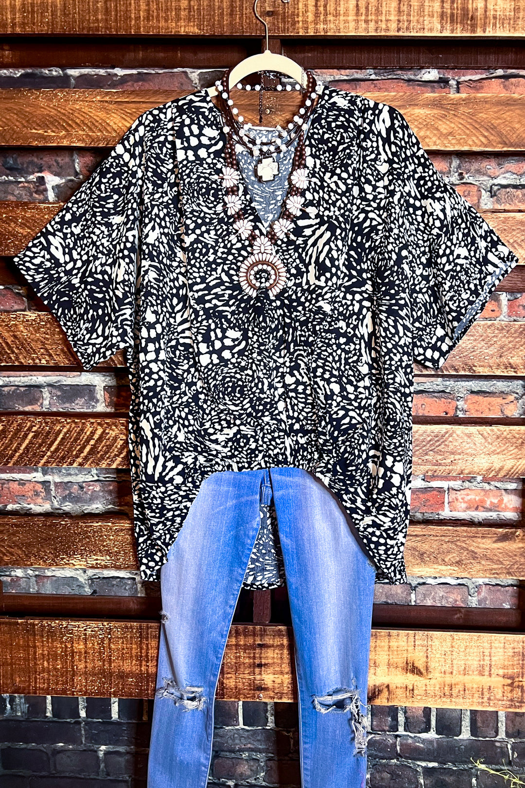 LEOPARD PRINT TOP IN NAVY  ------------ SALE