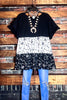 GRACEFUL SIMPLICITY FLORAL BABYDOLL TOP IN BLACK & WHITE