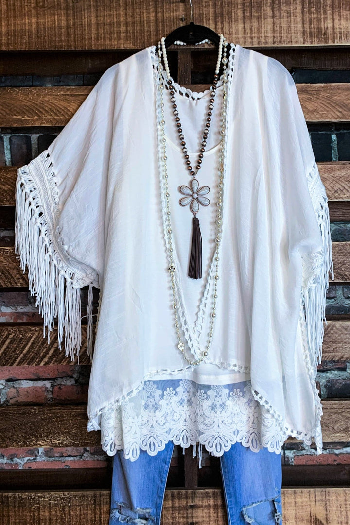 LIVING FREE BOHO CROCHET FRINGE KIMONO IN OFF-WHITE